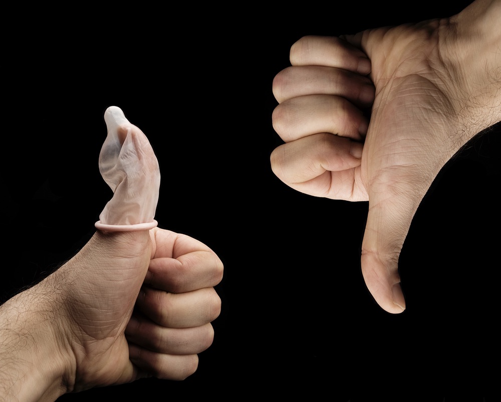 Sexo con condón- Shutterstock