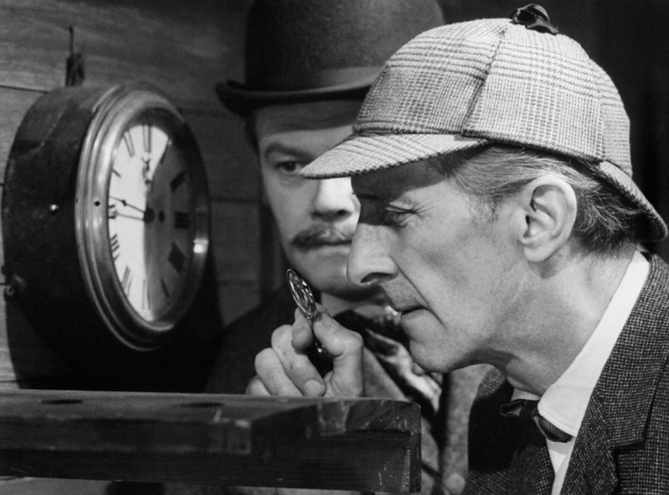 Peter Cushing como Sherlock Holmes, con Nigel Stock, como el Dr Watson c