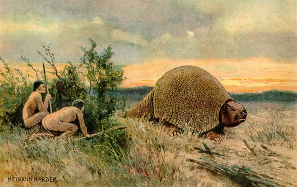 Ilustración que representa a dos pobladores antiguos de América con un glyptodon. / Wikipedia